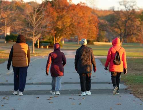 Clients on a walk outside in the fall