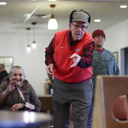 Senior Gentleman playing a gam